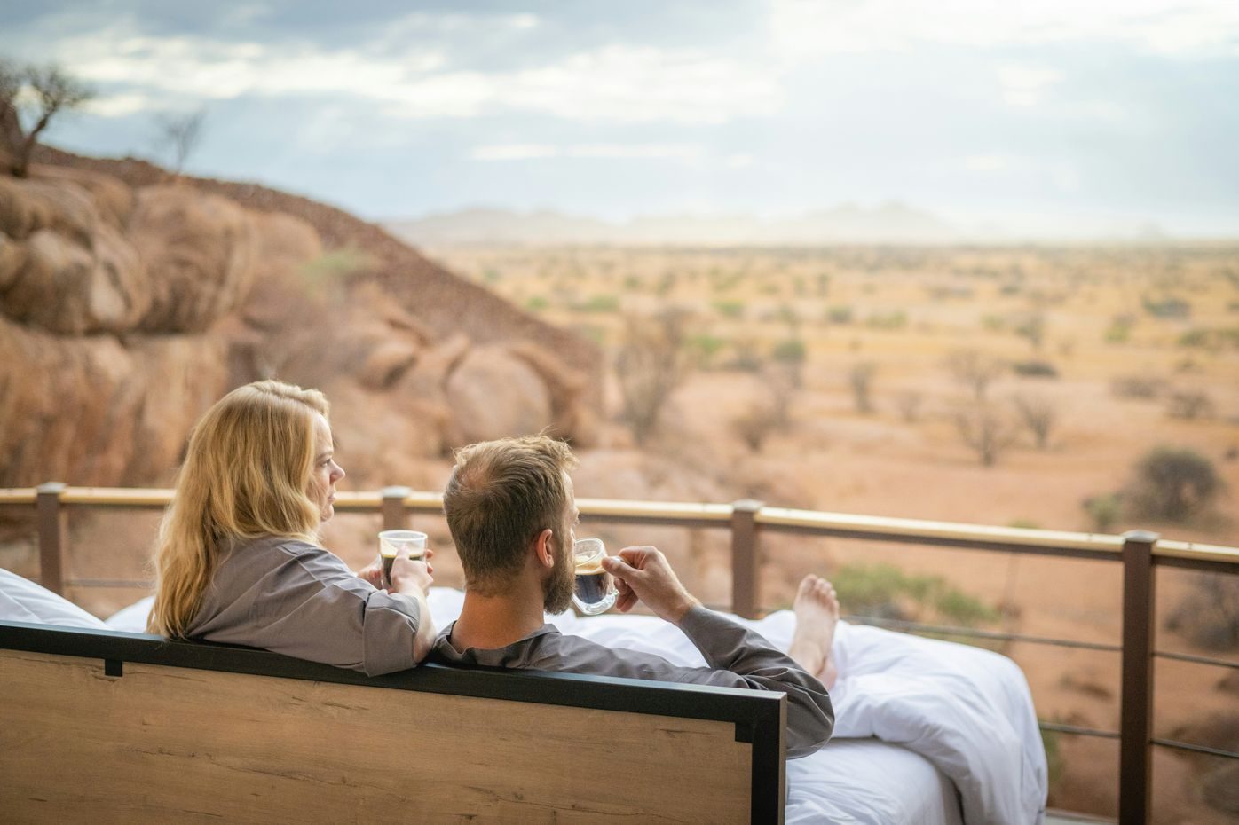 Clients enjoying sundowners on a safari deck